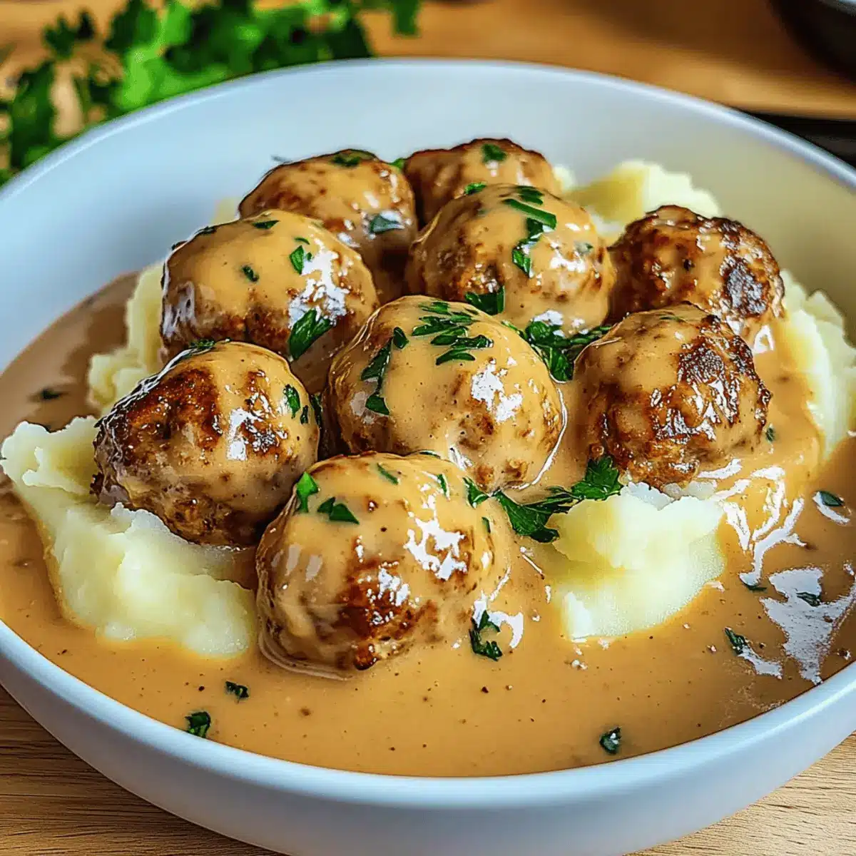 Hackbällchen in cremiger Sauce mit Kartoffelpüree
